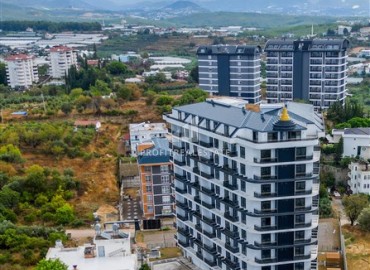 Двухкомнатная квартира, 62м², с чистовой отделкой в элитной новостройке в Авсалларе, Алания ID-18193 фото-13