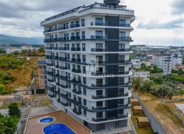 Двухкомнатная квартира, 62м², с чистовой отделкой в элитной новостройке в Авсалларе, Алания ID-18193 фото-15