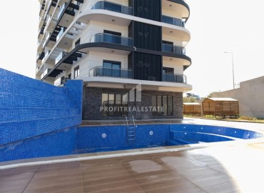 Двухкомнатная квартира, 62м², с чистовой отделкой в элитной новостройке в Авсалларе, Алания ID-18193 фото-16