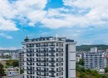 Двухкомнатная квартира, 62м², с чистовой отделкой в элитной новостройке в Авсалларе, Алания ID-18193 фото-17