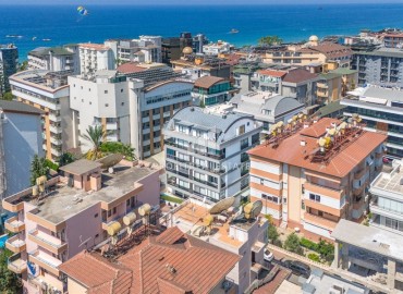 Уютная двухкомнатная квартира, 55м² в современном комплексе в самом центре Алании, в 80 метрах от пляжа Клеопатры ID-18195 фото-10
