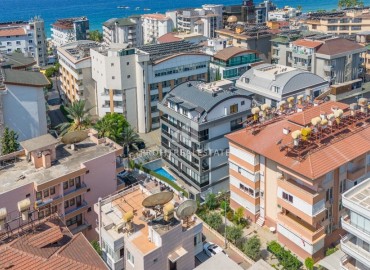 Уютная двухкомнатная квартира, 55м² в современном комплексе в самом центре Алании, в 80 метрах от пляжа Клеопатры ID-18195 фото-12
