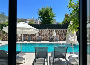 Уютная двухкомнатная квартира, 65м², в новостройке с чудесной локацией в центре Алании, в 150м от моря ID-18199 фото-18
