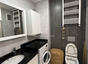 Меблированная квартира с отоплением, тремя спальнями и отдельной кухней, 140м², в элитной резиденции у моря в центре Алании под ВНЖ ID-18201 фото-16