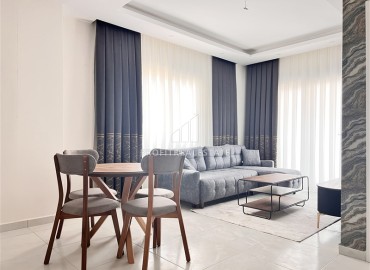 Квартира с одной спальней, 50м², в комплексе с хорошей инфраструктурой в Махмутларе, 600м от моря, Алания ID-18208 фото-3