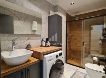 Меблированная квартира 1+1 с двумя балконами, 55м², в комплексе с хорошей инфраструктурой в Махмутларе в 350 метрах от моря ID-18209 фото-11