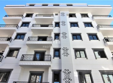 Двухкомнатные апартаменты со стильным интерьером, 55м², в новом комплексе с хорошей инфраструктурой в Махмутларе, Алания ID-18210 фото-1