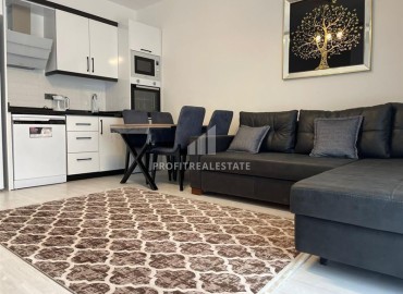 Двухкомнатные апартаменты со стильным интерьером, 55м², в новом комплексе с хорошей инфраструктурой в Махмутларе, Алания ID-18210 фото-2