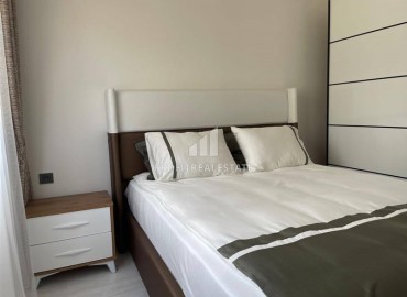 Двухкомнатные апартаменты со стильным интерьером, 55м², в новом комплексе с хорошей инфраструктурой в Махмутларе, Алания ID-18210 фото-6