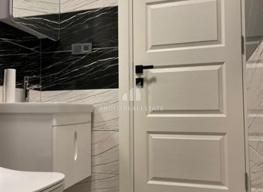 Двухкомнатные апартаменты со стильным интерьером, 55м², в новом комплексе с хорошей инфраструктурой в Махмутларе, Алания ID-18210 фото-9