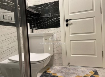 Двухкомнатные апартаменты со стильным интерьером, 55м², в новом комплексе с хорошей инфраструктурой в Махмутларе, Алания ID-18210 фото-11