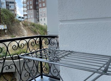 Двухкомнатные апартаменты со стильным интерьером, 55м², в новом комплексе с хорошей инфраструктурой в Махмутларе, Алания ID-18210 фото-12