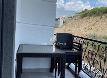 Двухкомнатные апартаменты со стильным интерьером, 55м², в новом комплексе с хорошей инфраструктурой в Махмутларе, Алания ID-18210 фото-13