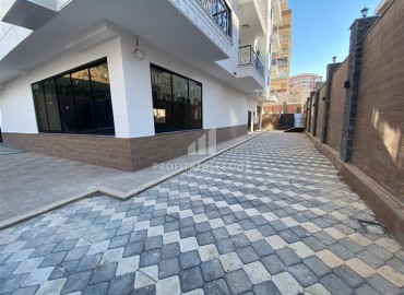 Двухкомнатные апартаменты со стильным интерьером, 55м², в новом комплексе с хорошей инфраструктурой в Махмутларе, Алания ID-18210 фото-16