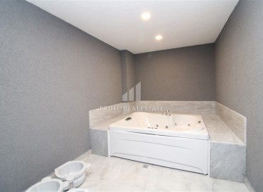 Двухкомнатные апартаменты со стильным интерьером, 55м², в новом комплексе с хорошей инфраструктурой в Махмутларе, Алания ID-18210 фото-19