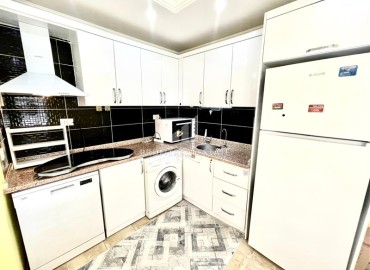 Бюджетная меблированная квартира с двумя спальнями, 80м², в 250м от моря, в недорогом доме в районе Махмутлар. Алания ID-18214 фото-5