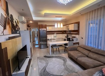 Элегантная видовая квартира с двумя спальнями, 118м², с видом на море в знаменитом комплексе Махмутлара, Алания ID-18216 фото-2