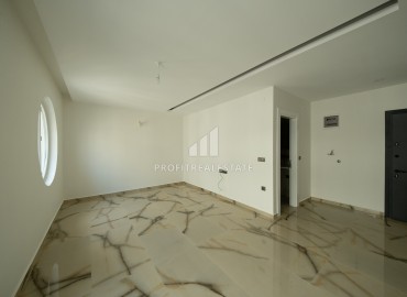 Апартаменты с одной спальней, 65м², в новостройке с хорошей инфраструктурой в Махмутларе, Алания, в 200м от моря ID-18080 фото-2