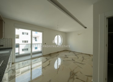 Апартаменты с одной спальней, 65м², в новостройке с хорошей инфраструктурой в Махмутларе, Алания, в 200м от моря ID-18080 фото-3