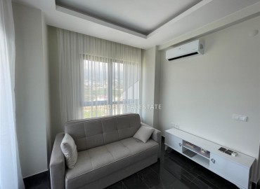 Готовая к проживанию, квартира 1+1, 60м², с видом на горы в новостройке премиум класса в Махмутларе, Алания ID-18225 фото-3