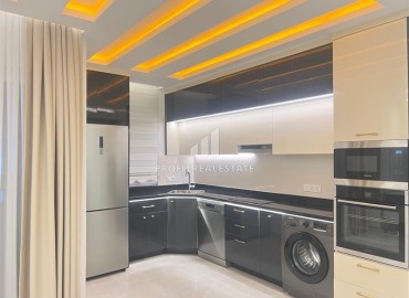 Меблированные двухкомнатные апартаменты, 69м², в новом элитном комплексе в 500м от моря в Махмутларе, Алания. ID-18228 фото-5