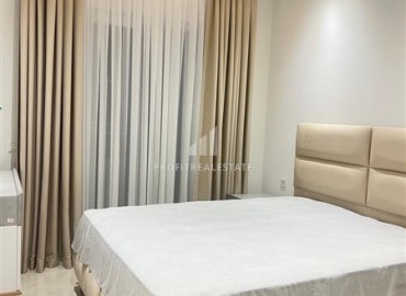 Меблированные двухкомнатные апартаменты, 69м², в новом элитном комплексе в 500м от моря в Махмутларе, Алания. ID-18228 фото-9