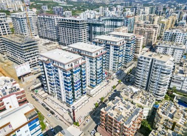 Меблированные двухкомнатные апартаменты, 69м², в новом элитном комплексе в 500м от моря в Махмутларе, Алания. ID-18228 фото-13