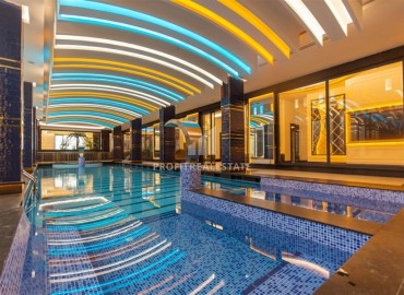 Меблированные двухкомнатные апартаменты, 69м², в новом элитном комплексе в 500м от моря в Махмутларе, Алания. ID-18228 фото-14