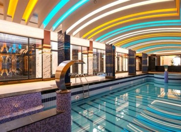 Меблированные двухкомнатные апартаменты, 69м², в новом элитном комплексе в 500м от моря в Махмутларе, Алания. ID-18228 фото-15