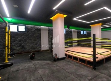 Меблированные двухкомнатные апартаменты, 69м², в новом элитном комплексе в 500м от моря в Махмутларе, Алания. ID-18228 фото-17