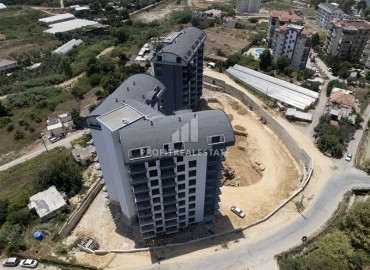 Масштабный проект от ведущей строительной компании в районе Алании Авсаллар, в 1500м от моря ID-8965 фото-3