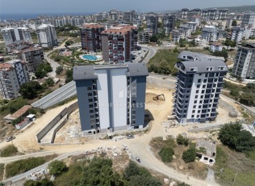 Масштабный проект от ведущей строительной компании в районе Алании Авсаллар, в 1500м от моря ID-8965 фото-5