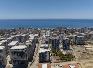 Готовые квартиры в центре Махмутлара, Аланья, 65-177 м2 ID-7147 фото-3