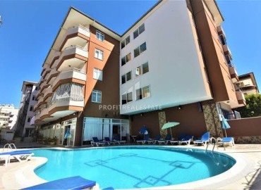 Симпатичная двухкомнатная квартира, 55м², в уютном комплексе в 350м от моря в центре района Оба, Алания ID-18012 фото-1