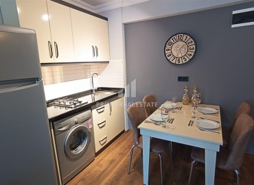 Симпатичная двухкомнатная квартира, 55м², в уютном комплексе в 350м от моря в центре района Оба, Алания ID-18012 фото-5