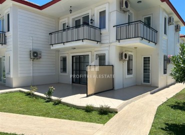 Меблированная квартира с тремя спальнями, 90м², с выходом в сад в уютном комплексе с бассейном, Кемер, Чамьюва ID-18231 фото-1