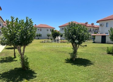 Меблированная квартира с тремя спальнями, 90м², с выходом в сад в уютном комплексе с бассейном, Кемер, Чамьюва ID-18231 фото-15