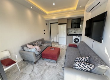 Двухкомнатные апартаменты, 40м², в малоквартирном комплексе в районе Алании - Оба ID-18233 фото-2