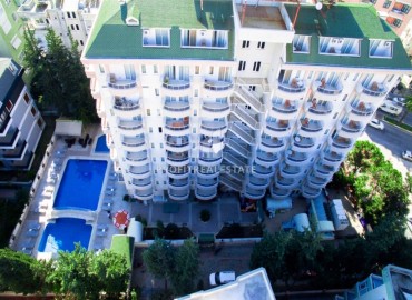 Меблированная двухкомнатная квартира, 40м² с видом на Аланийскую крепость в центре Алании, в уютном комплексе под ВНЖ ID-18238 фото-1