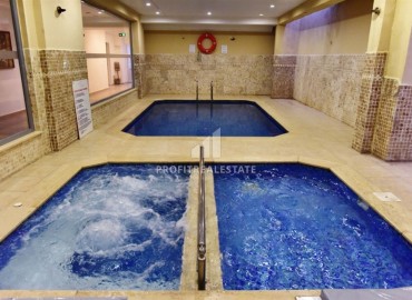 Меблированная двухкомнатная квартира, 40м² с видом на Аланийскую крепость в центре Алании, в уютном комплексе под ВНЖ ID-18238 фото-12