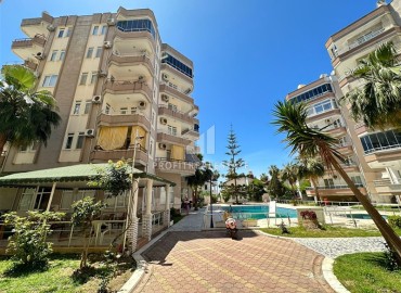 Квартира 2+1, 115м², с отдельной кухней в уютной резиденции в 100м от моря в Махмутларе, Алания ID-18239 фото-1