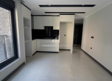 Апартаменты 1+1, 40м², в новой элитной резиденции в центре Алании, в районе Хасбахче по привлекательной цене ID-18241 фото-2