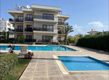 Уютные апартаменты с двумя спальнями, 95м², в комплексе с бассейном в районе Серик, Белек, Анталия ID-18248 фото-1