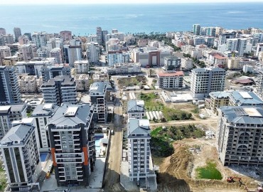 Стильная квартира с одной спальней, 50м², в новом комплексе премиум класса в центре Махмутлара, Алания ID-18262 фото-2