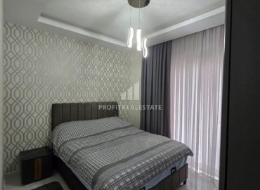 Стильная квартира с одной спальней, 50м², в новом комплексе премиум класса в центре Махмутлара, Алания ID-18262 фото-8