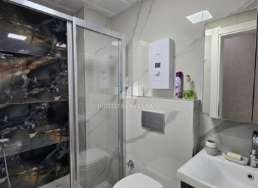 Стильная квартира с одной спальней, 50м², в новом комплексе премиум класса в центре Махмутлара, Алания ID-18262 фото-10