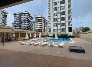 Стильная квартира с одной спальней, 50м², в новом комплексе премиум класса в центре Махмутлара, Алания ID-18262 фото-11