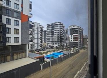 Стильная квартира с одной спальней, 50м², в новом комплексе премиум класса в центре Махмутлара, Алания ID-18262 фото-12