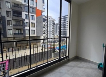 Стильная квартира с одной спальней, 50м², в новом комплексе премиум класса в центре Махмутлара, Алания ID-18262 фото-13