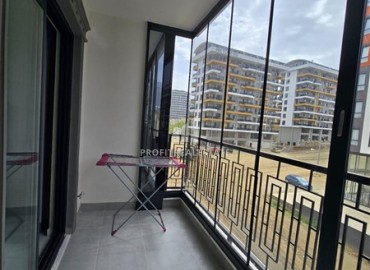 Стильная квартира с одной спальней, 50м², в новом комплексе премиум класса в центре Махмутлара, Алания ID-18262 фото-14